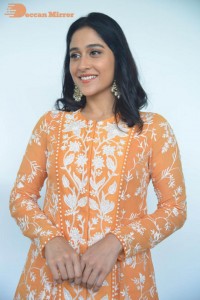 Actress Regina Cassandra Actress poses in a Orange Dress for a Photoshoot