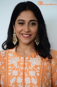 Actress Regina Cassandra Actress poses in a Orange Dress for a Photoshoot