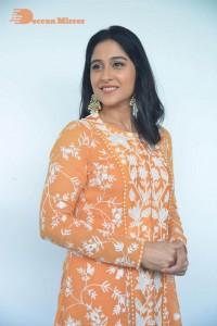 Actress Regina Cassandra Actress poses in a Orange Dress for a Photoshoot