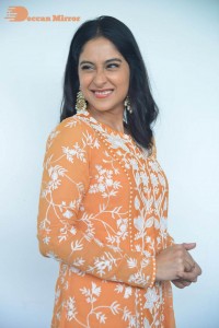 Actress Regina Cassandra Actress poses in a Orange Dress for a Photoshoot