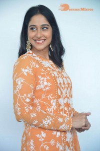 Actress Regina Cassandra Actress poses in a Orange Dress for a Photoshoot