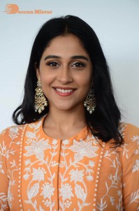 Actress Regina Cassandra Actress poses in a Orange Dress for a Photoshoot