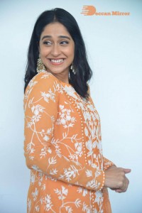 Actress Regina Cassandra Actress poses in a Orange Dress for a Photoshoot