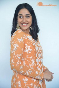 Actress Regina Cassandra Actress poses in a Orange Dress for a Photoshoot