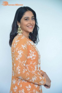 Actress Regina Cassandra Actress poses in a Orange Dress for a Photoshoot