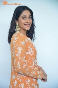Actress Regina Cassandra Actress poses in a Orange Dress for a Photoshoot