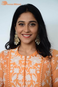 Actress Regina Cassandra Actress poses in a Orange Dress for a Photoshoot