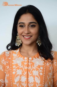 Actress Regina Cassandra Actress poses in a Orange Dress for a Photoshoot
