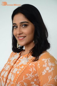 Actress Regina Cassandra Actress poses in a Orange Dress for a Photoshoot