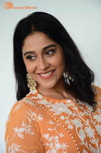 Actress Regina Cassandra Actress poses in a Orange Dress for a Photoshoot