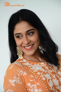 Actress Regina Cassandra Actress poses in a Orange Dress for a Photoshoot