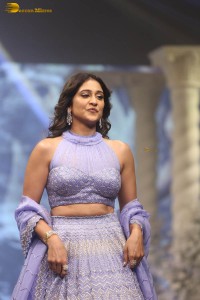 actress regina cassandra in a purple lehenga choli doing a ramp walk