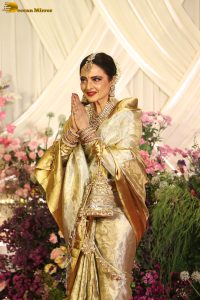veteran bollywood actress rekha dazzles in a gold color saree