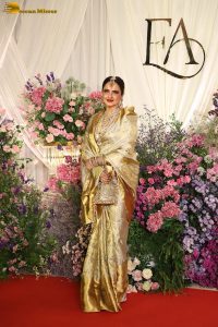 veteran bollywood actress rekha dazzles in a gold color saree