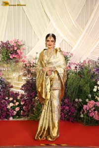 veteran bollywood actress rekha dazzles in a gold color saree