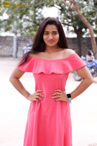 indian actress rekha nirosha in a pink dress