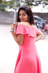 indian actress rekha nirosha in a pink dress