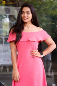 indian actress rekha nirosha in a pink dress