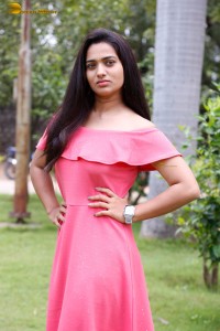 indian actress rekha nirosha in a pink dress