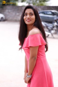 indian actress rekha nirosha in a pink dress