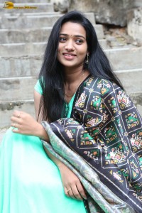 actress rekha nirosha in a green salwar cute photoshoot