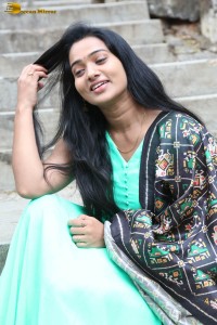 actress rekha nirosha in a green salwar cute photoshoot