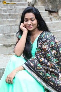 actress rekha nirosha in a green salwar cute photoshoot