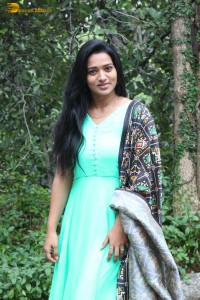 actress rekha nirosha in a green salwar cute photoshoot