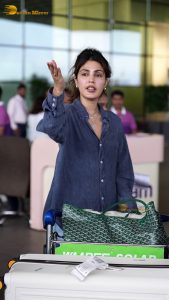 actress rhea chakraborty chic look in blue shirt