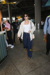 actress Rhea Chakraborty stylish in shirt and sunglasses