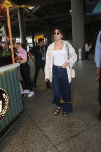 actress Rhea Chakraborty stylish in shirt and sunglasses