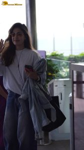actress Rhea Chakraborty chic look at mumbai airport