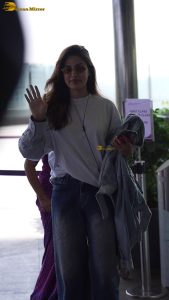 actress Rhea Chakraborty chic look at mumbai airport