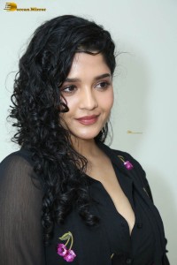actress ritika singh in a black midi dress