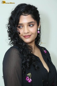 actress ritika singh in a black midi dress