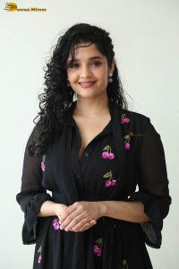 actress ritika singh in a black midi dress