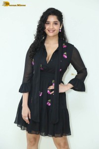 actress ritika singh in a black midi dress