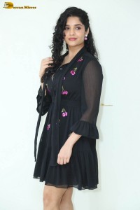actress ritika singh in a black midi dress