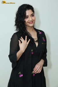 actress ritika singh in a black midi dress