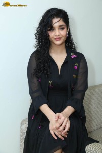 actress ritika singh in a black midi dress