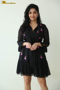 actress ritika singh in a black midi dress
