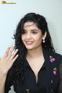 actress ritika singh in a black midi dress