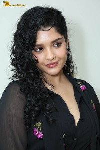actress ritika singh in a black midi dress