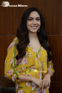 Actress Ritu Varma in a Yellow Dress