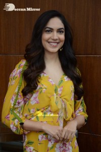 Actress Ritu Varma in a Yellow Dress