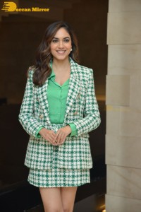 Ritu Varma in a green mini skirt attending modern love press meet