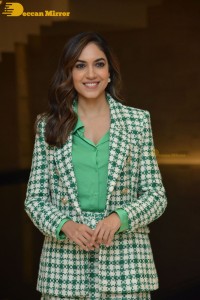 Ritu Varma in a green mini skirt attending modern love press meet