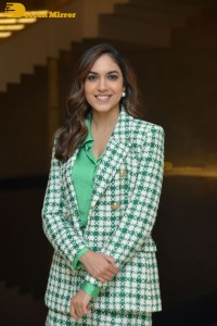 Ritu Varma in a green mini skirt attending modern love press meet