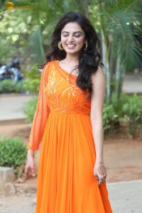 indian actress roshni sahota glamorous in a shoulderless orange dress