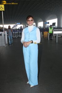 actress Rubina Dilaik in white and blue dress at mumbai airport